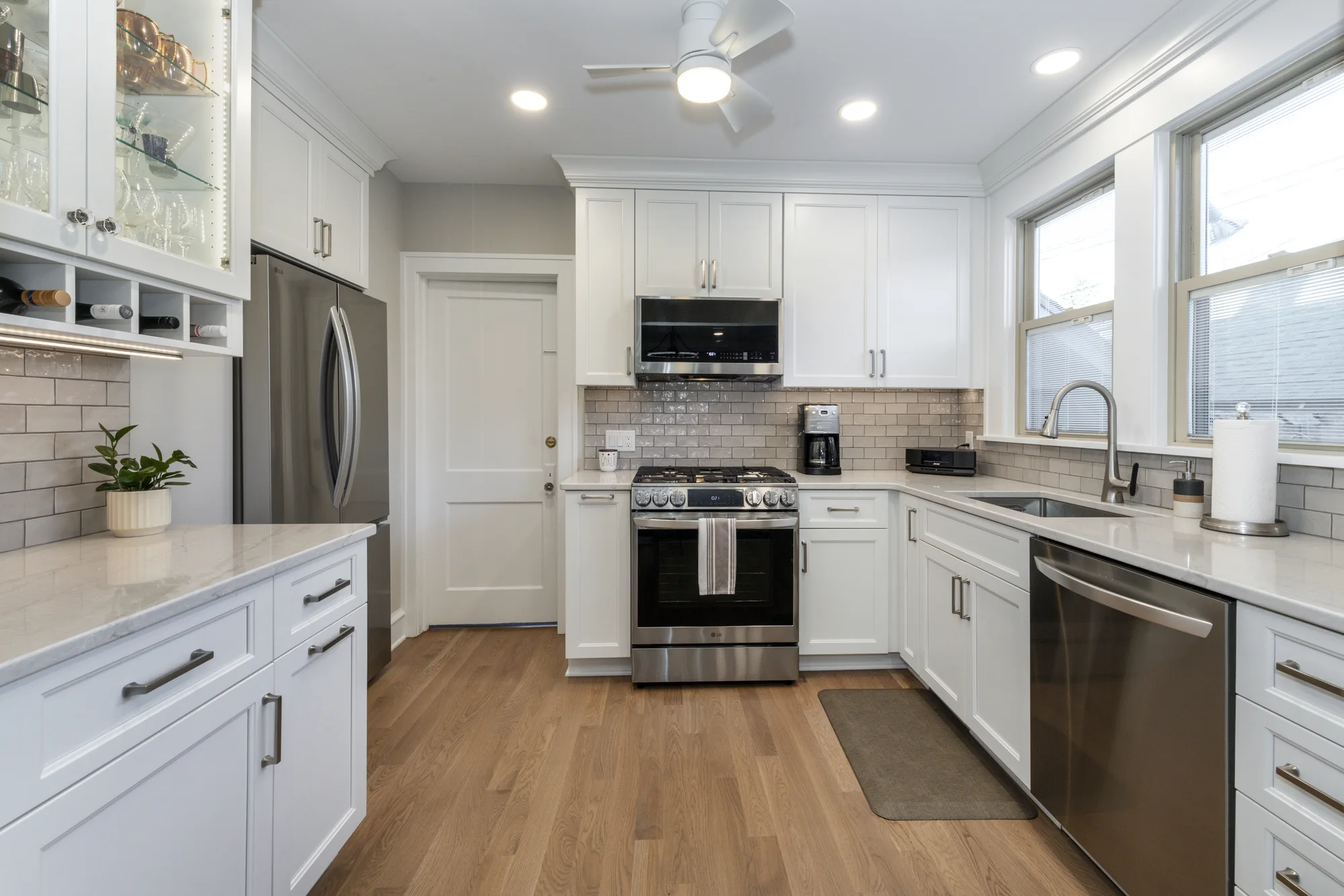 Traditional white kitchen with stainless appliances in Lakewood