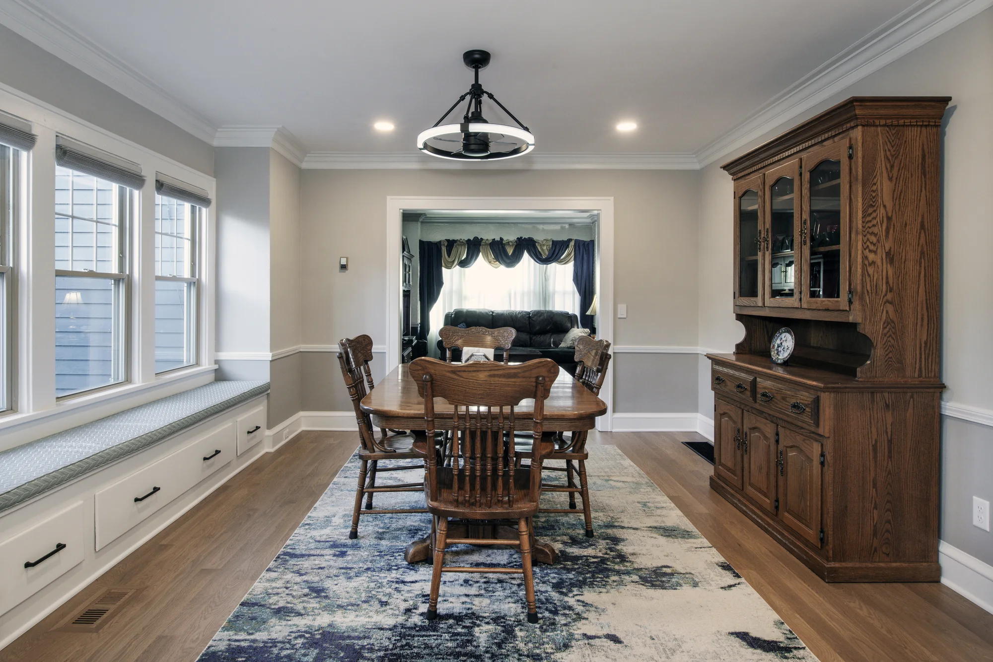 Dining room with built-in window storage